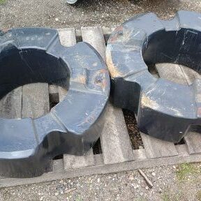 Pair of 1000lb CIH wheel weights. (2000lbs total)